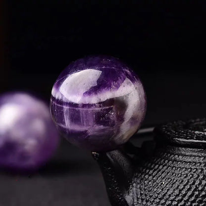 What the Earth Remembers – 30mm Crystal Sphere with Wooden Stand